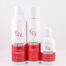 Drei Produkte der KrX Aesthetics Anti-Akne-Serie: Face Wash, Toner und Cream in weiß-roten Verpackungen vor neutralem Hintergrund